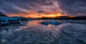 sunset over icy lagoon